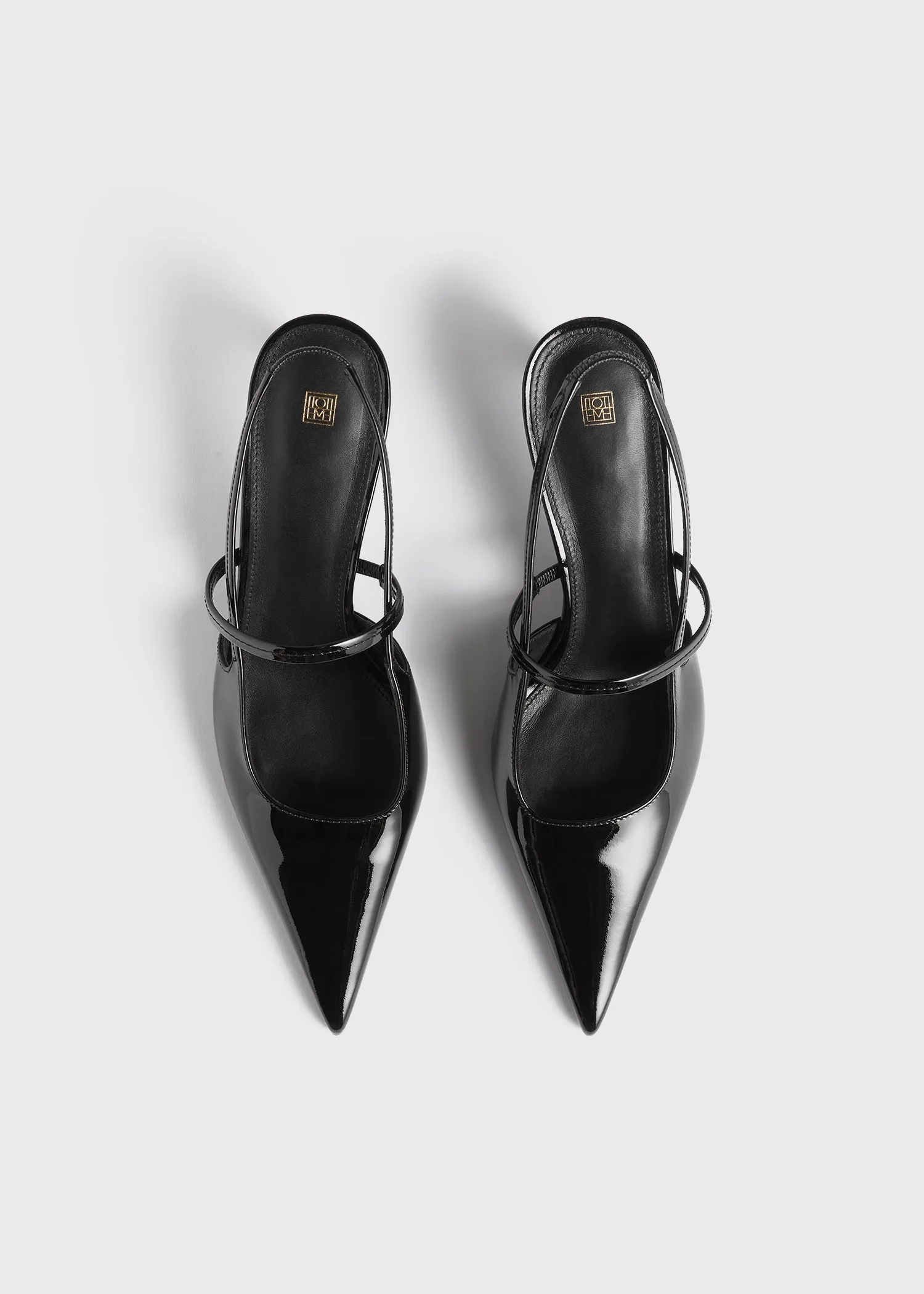 Sharp patent-leather slingbacks black